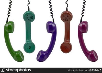 colorful telephone receivers isolated on white background