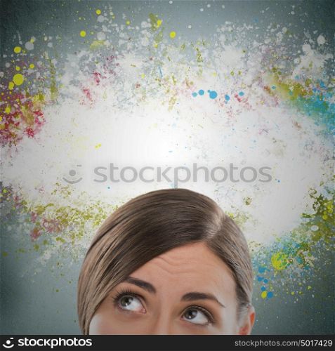 Colorful Thinking. Woman against gray background and colorful splashes with copyspace