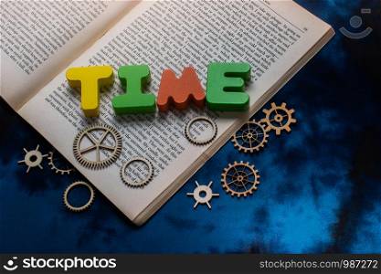 Colorful time wording with gears as time concept