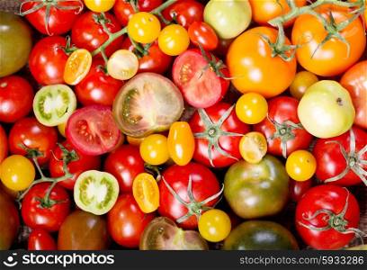 colorful tomatoes as background