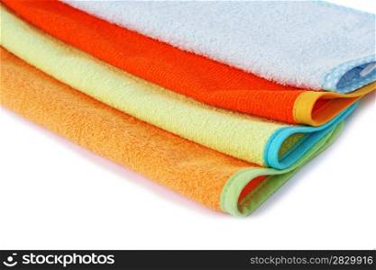 Colorful towels on white background.