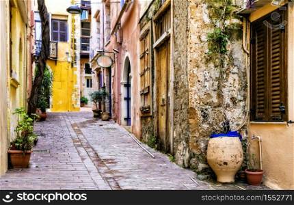 Colorful traditional Greece series - narrow streets in old town of Chania, Crete island. traditional floral streets of old town Chania, Crete island, Greece