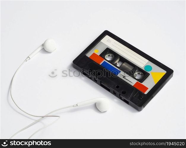 colorful vintage cassette tape with headphones. High resolution photo. colorful vintage cassette tape with headphones. High quality photo