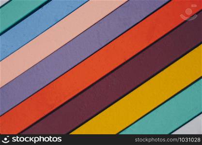Colorful vintage pattern background on wooden parquet planks