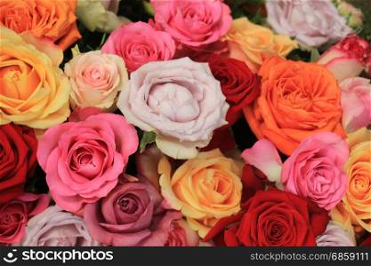 Colorful wedding roses in a floral wedding decoration
