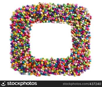 Colorful wooden beads frame on white background