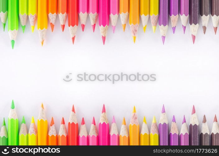 Colorful wooden crayon on white background.. Colorful wooden crayon