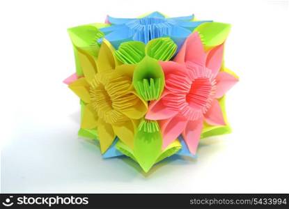 "Colorfull origami unit "Blue, yellow, pink flower" isolated on white"