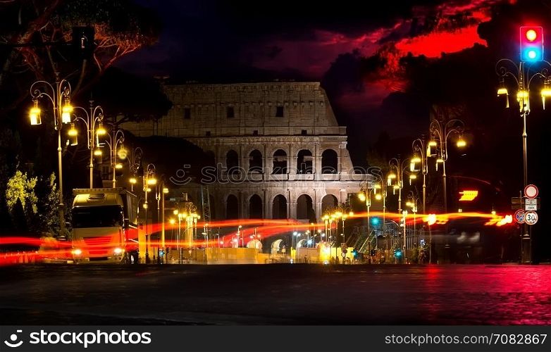 Colosseum and beautiful sky at night in Rome, Italy