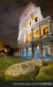 Colosseum arena, night view, vertical frame. Rome, Italy.