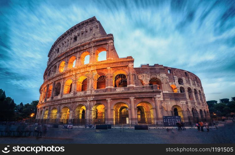 Colosseum in Rome, Italy - Long exposure shot. The Rome Colosseum was built in the time of Ancient Rome in the city center. It is the main travel destination and tourist attraction of Italy.