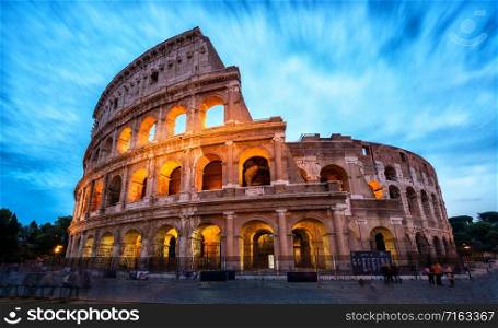 Colosseum in Rome, Italy - Long exposure shot. The Rome Colosseum was built in the time of Ancient Rome in the city center. It is the main travel destination and tourist attraction of Italy.