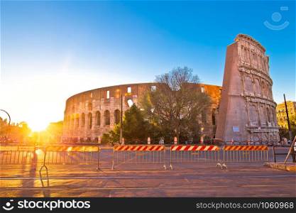 Colosseum of Rome sunset view, famous landmark of eternal city, capital of Italy