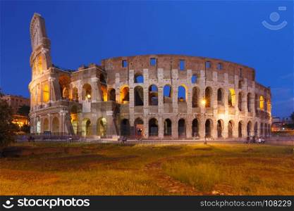 Colosseum or Coliseum at night, Rome, Italy.. Colosseum or Coliseum during blue hour, also known as the Flavian Amphitheatre, the largest amphitheatre ever built, in the centre of the old city of Rome, Italy.