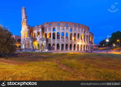 Colosseum or Coliseum at night, Rome, Italy.. Colosseum or Coliseum during blue hour, also known as the Flavian Amphitheatre, the largest amphitheatre ever built, in the centre of the old city of Rome, Italy.