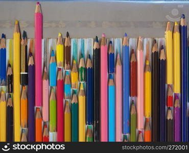 colour pencils of many different colors and length. many colour pencils