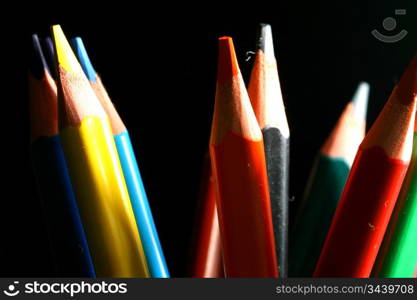 colour pencils on black macro close up