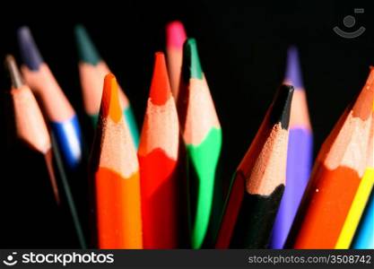 colour pencils on black macro close up