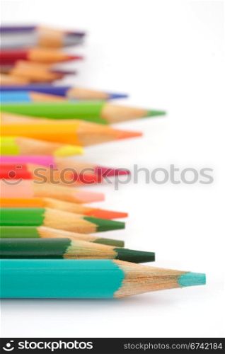 Colour pencils over white, studio isolated