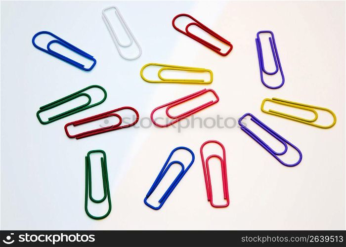 Coloured paper clips isolated on a white background