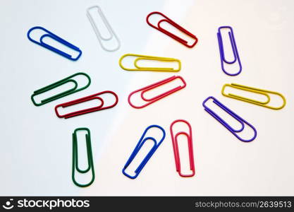 Coloured paper clips isolated on a white background