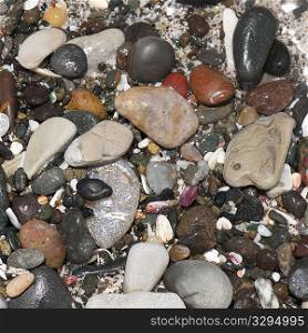 Coloured stones and pebbles along the shoreline in Costa Rica