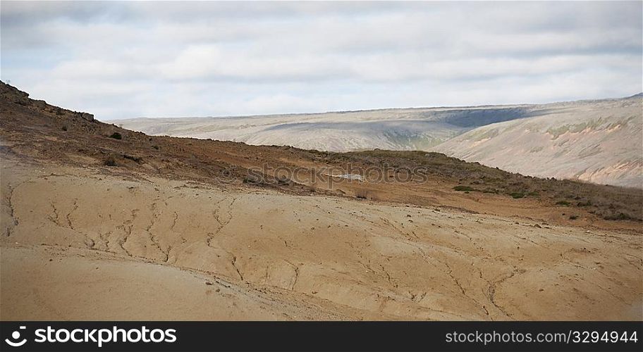Colourful barren volcanic ash slope