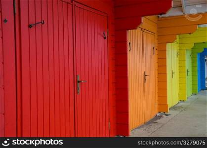Colourful beach huts.