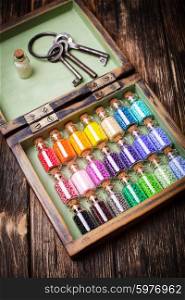 colourful beads in mini retro glass bottles. Handmade set in box. colourful beads