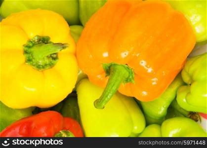 Colourful bell peppers arranged at the market stand