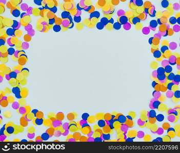 colourful confetti frame blue background