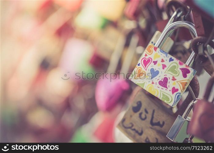 Colourful cute love locks on Markartsteg, Salzburg; Copy space and blurryness