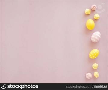 colourful easter eggs with sweets table