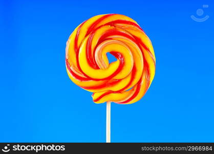 Colourful lollipop against the colourful background