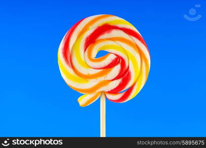 Colourful lollipop against the colourful background