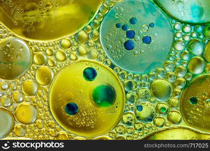 Colourful oil ink bubbles and drops.Abstract paint design template mixed texture background. Liquid decorative color backdrop. Wallpaper pattern.. Colourful oil ink bubbles and drops. Abstract template mixed texture background. Wallpaper pattern.