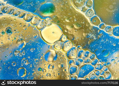 Colourful oil ink bubbles and drops.Abstract paint design template mixed texture background. Liquid decorative color backdrop. Wallpaper pattern.. Colourful oil ink bubbles and drops. Abstract template mixed texture background. Wallpaper pattern.