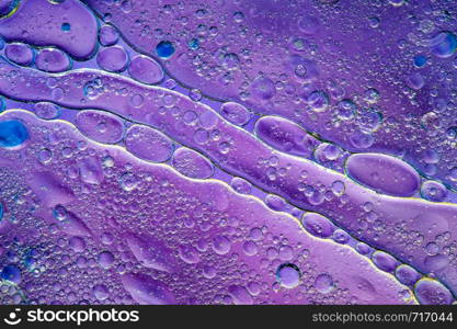 Colourful oil ink bubbles and drops.Abstract paint design template mixed texture background. Liquid decorative color backdrop. Wallpaper pattern.. Colourful oil ink bubbles and drops. Abstract template mixed texture background. Wallpaper pattern.