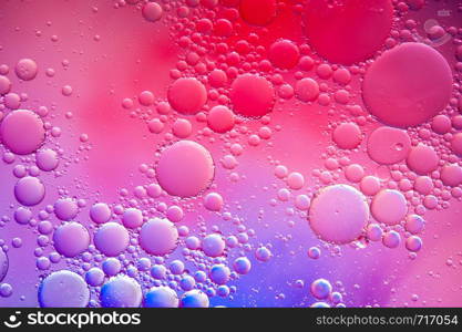 Colourful oil ink bubbles and drops.Abstract paint design template mixed texture background. Liquid decorative color backdrop. Wallpaper pattern.. Colourful oil ink bubbles and drops. Abstract template mixed texture background. Wallpaper pattern.