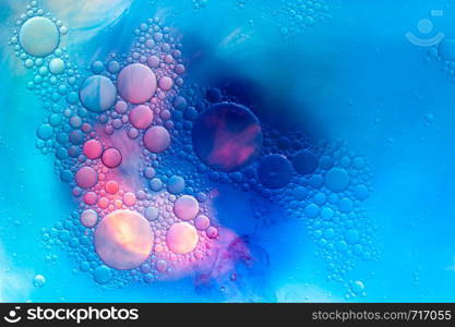 Colourful oil ink bubbles and drops.Abstract paint design template mixed texture background. Liquid decorative color backdrop. Wallpaper pattern.. Colourful oil ink bubbles and drops. Abstract template mixed texture background. Wallpaper pattern.