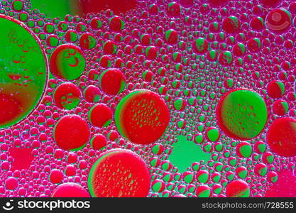 Colourful oil ink bubbles and drops.Abstract paint design template mixed texture background. Liquid decorative color backdrop. Wallpaper pattern.. Colourful oil ink bubbles and drops. Abstract template mixed texture background. Wallpaper pattern.