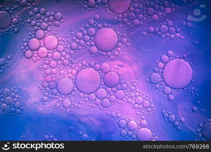 Colourful oil ink bubbles and drops.Abstract paint design template mixed texture background. Liquid decorative color backdrop. Wallpaper pattern.. Colourful oil ink bubbles and drops. Abstract template mixed texture background. Wallpaper pattern.