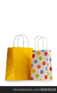 Colourful paper shopping bags isolated on white