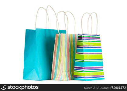 Colourful paper shopping bags isolated on white