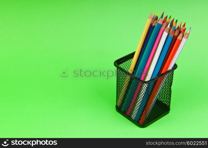 Colourful pencils on the background