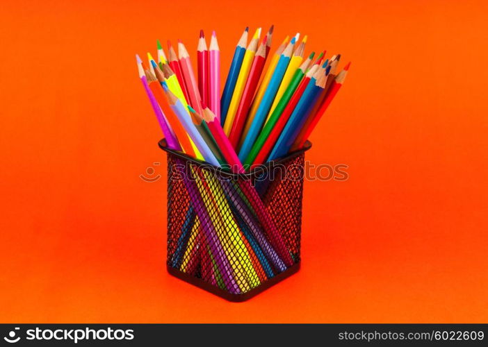 Colourful pencils on the background