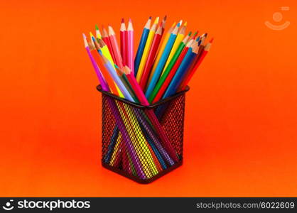 Colourful pencils on the background