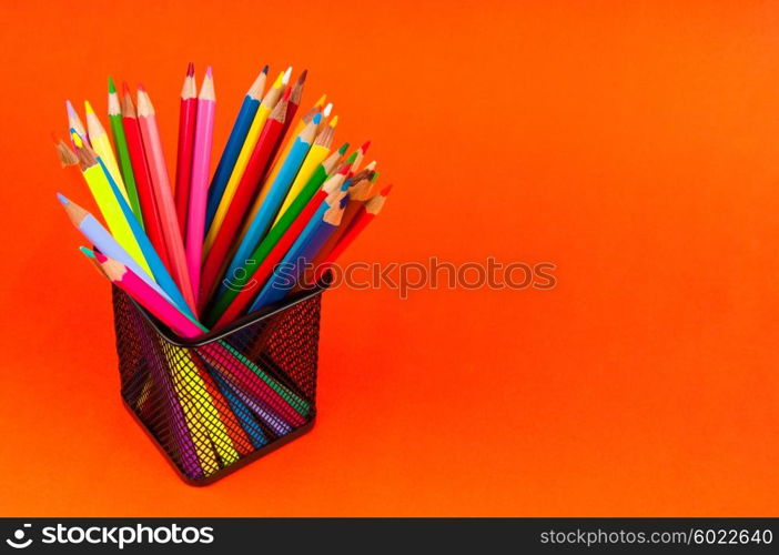 Colourful pencils on the background