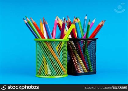 Colourful pencils on the background