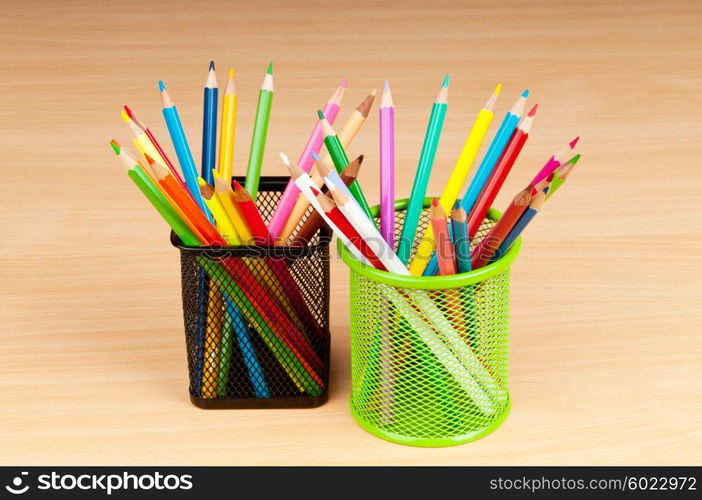 Colourful pencils on the background